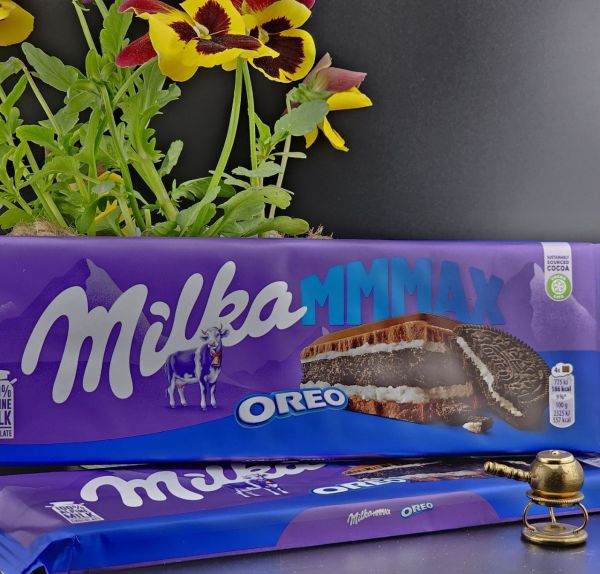 Шоколад Milka Oreo молочна начинка та хрумке печиво орео Шоколад Milka Oreo молочна начинка та хрумке печиво орео